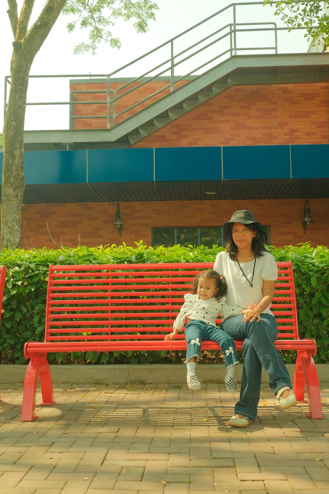 grandmother with child on bench