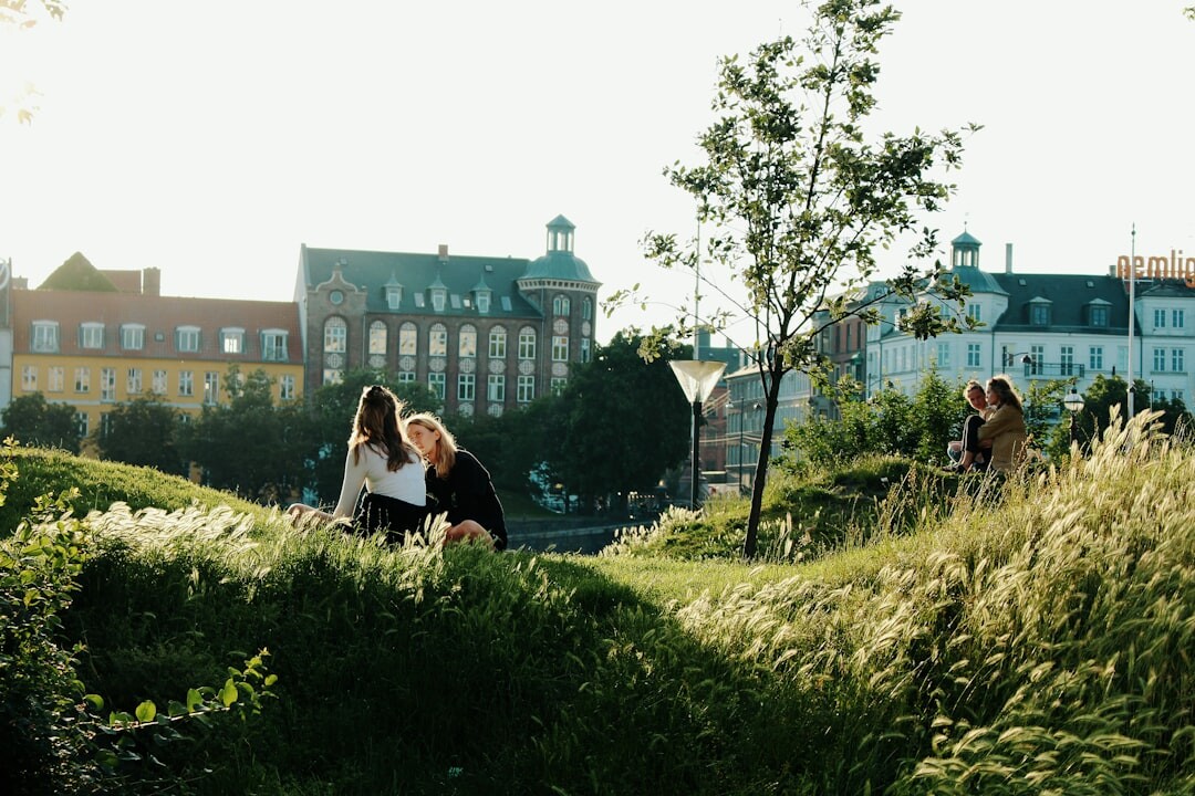 young danish man taking photos outdoors