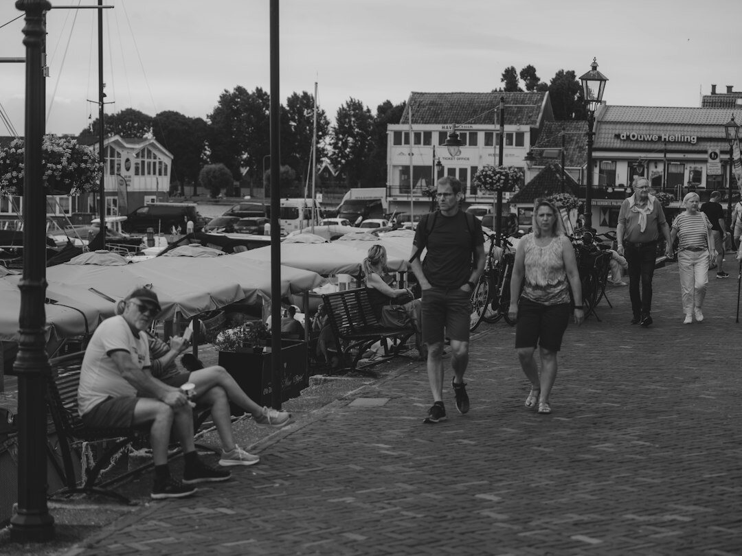 Black and white photo of a small Danish community market gathering